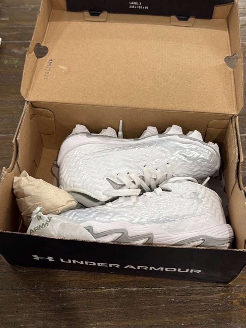 Under Armour Kids White Baseball Cleats with Subtle Gray Accents